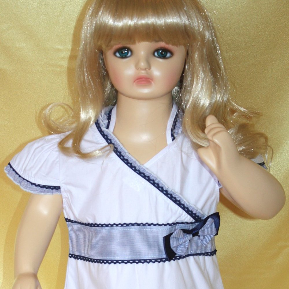 Blue and white dress with a hood